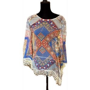 Shiloh 770 multicolored top with pretty trim.